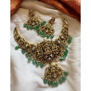 Grand Lakshmi Mahal with Peacock Intricate Lakshmi Pendant Pastel Beads Neckpiece 