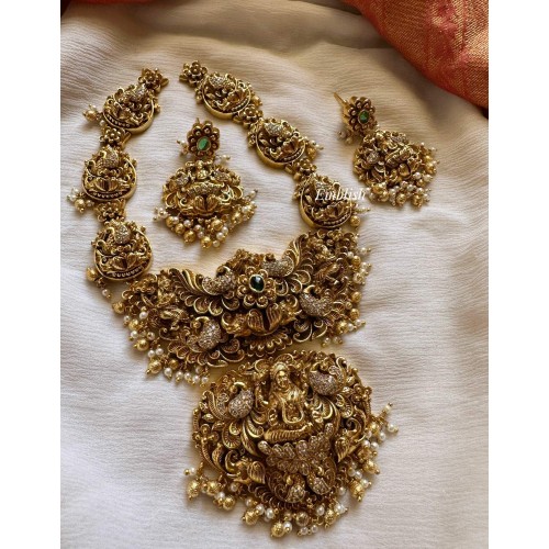 Grand Gold alike AD Lakshmi with Peacock intricate Short Neckpiece - Gold Beads